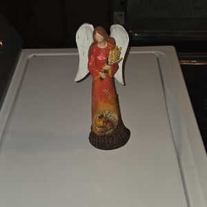 Orange and White Angel Figurine